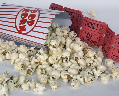 cyber security movies and popcorn with ticket stubs red and white