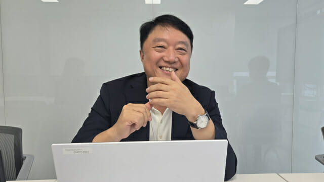 CEO Tae Gyun Kim Smiling