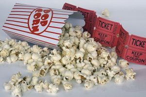 cyber security movies and popcorn with ticket stubs red and white